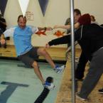 Cape assistant coach Rick Brokaw gets tossed in after the Vikings' victories in the Henlopen Conference tournament. BY DAN COOK