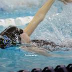 Cape's Lauren Kelley gets points in the backstroke. BY DAN COOK