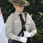 Delaware State Park Ranger Katherine Nelson stands at attention as part of the color guard. BY NICK ROTH