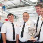 Lewes Fire Department officers Director Butch Archer, Deputy Chief Craig Reynolds and President Ed Schaeffer present RBVFC President Ron Blizzard and Chief Chatham Marsch with a plaque. BY DENY HOWETH
