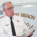 Millsboro Fire Company President Ron O'Neal makes a presentation. BY DENY HOWETH