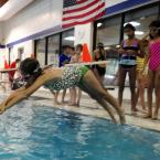 Sage Cherico learns to dive after the WLSL. BY DAN COOK