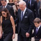 The Biden family joins hands as they enter Legislative Hall for the memorial service honoring former Attorney General Beau Biden, who died of brain cancer. BY JOEY MELVIN