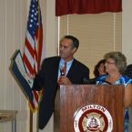 State Sen. Ernie Lopez, R-Lewes, reads a tribute from the Delaware State Senate in celebration of the Milton Fire Department Ladies Auxiliary's 50th anniversary during a luncheon Aug. 8. BY MADDY LAURIA