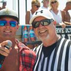 Steve Capik, left, keeps the crowd rolling while ref Paul Bauer waits for the next event. BY DENY HOWETH