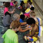 Compassionate volunteers meet their students before they get wet. BY DAN COOK