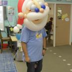 Custodian Miguel Almine is also a talented balloon artist. He created this Santa balloon hat for the kids to see at the Holiday Shop.