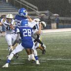 A Cape player gets jacked up by Dover’s Erick Samuels.