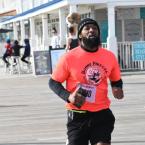 James Austin hits the finish line in 20:51.