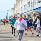 Cecily Fisher earns third place in the 60-69 women’s category with her time of 28:49.