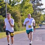 David Cowie and Mike Mitchell race down Market Street to the finish.