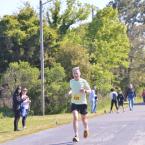 Paul Montini wins the half-marathon masters race in 1:27:58.