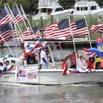 The Lewes-Rehoboth Beach Rotary Club wishes everybody a Happy Fourth of July. Bill Huntley is at the helm of the 21-foot center-console boat.