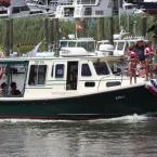 Little Lulu and Capt. Ralph Scott make their way down the canal.