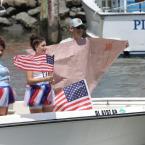 Happy Fourth of July is the message from Jenn, Sydney, Sofia, Gabe, Billy and Amy aboard the Foxy Lady Liberty.