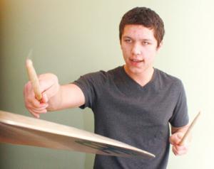 Zac Mayfield helped write Cape’s signature marching cadence. Soon, he’ll bring his thunderous drumming to European venues. NONE ROB KUNZIG PHOTO