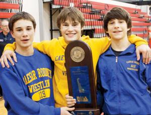 Kaleb Lemaire,Trey Mitchell and Tony Scarfo pose for a picture after Caesar Rodney won the dual meet state championship with a win over St. Mark's.