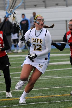 Meg Bartley scored eight goals, dished off three assists and dominated the draw, all in the first half, as Cape led visiting Ursuline 15-5. BY DAN COOK