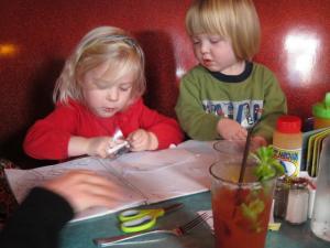 Giles Short tells Maisy Peach she ought to be coloring a picture of a boat.  No, they weren't having Bloody Marys for breakfast. BY DENNIS FORNEY