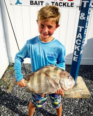 Ryan Kleban fished Site 10 with a sand flea to capture this eight-pound sheepshead. SOURCE: HENLOPEN BAIT AND TACKLE