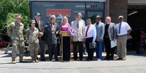 Gathered in honor of Charles Garrod are (l-r) Maj. Gen. Michael Berry, Delaware National Guard adjutant general; Brig. Gen. Karen Berry, Connecticut National Guard assistant adjutant general; Paul Davis, Vietnam Veterans of America Delaware Council president; Bill Richardson, Korean War veteran; Dave Skocik, Delaware Veterans Coalition president; Kathy DeAngelis and Doug DeAngelis (partially obscured) of Patriot Auto & Truck Care; Charles Garrod, speaker and honoree; Dover Mayor Robin Christiansen; Larence Kirby, Delaware Commission of Veteran Services; the Rev. John Riley; and Milford Mayor Arthur Campbell. SUBMITTED PHOTO