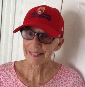 Mary Ellen South, an avid baseball fan, models her Washington Nationals cap. It’s one of many coverings she uses to protect her scalp now and in the future. SUBMITTED PHOTO