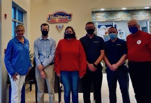 Mountaire employees preparing items for delivery to the Clothing Our Kids volunteer center are (l-r) Communications and Community Relations Director Cathy Bassett; IT Help Desk Support Manager Josh Barre; Communications and Community Relations Specialist Rachel Lord; IT Manufacturing and Support Director Brett Ryan and Network Analyst David Plum; and Clothing Our Kids President Bob Blouin. SUBMITTED PHOTOS