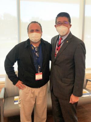 Beebe’s L.O.V.E. Letter Award winner Julio Tijerina, CAT scan technologist, left, receives congratulations from Dr. David Tam, president and CEO of Beebe Healthcare. SUBMITTED PHOTO