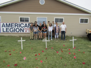 Gathered outside American Legion Post 17 are in back (l-r) Thad Karl, Christian Fuscellaro, Isaac League, Lucas Santini and Emmanuel Majull. In front are Addison Bowman, Abigail Scheffer, Rylee Tipton, Gianna Decker, Marina Santini, Nancy Bush and Ed Bergen. SUBMITTED PHOTOS