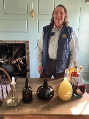 Bill Hicks displays an array of potent portables during a bartender training session at Sussex Tavern. JACK CLEMONS PHOTO
