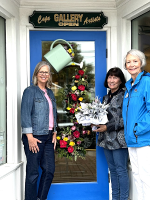 The Cape Artists Gallery won the $250 grand prize, donated by Active Adults Realty, in this year’s Lewes in Bloom May Day decorating contest May 4. Shown are (l-r) Francine Balinskas, Active Adults Realty; Kath Johnson, Cape Artists Gallery; and Dianne Stevens, co-chair, Lewes in Bloom. SUBMITTED PHOTOS