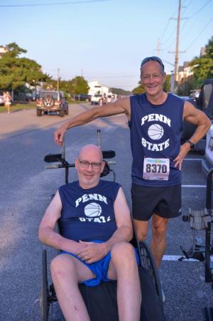 Mike Piorkowski is ready to push his older brother Joe Piorkowski Jr. at the Penn State College Day 5K. DAVE FREDERICK PHOTOS