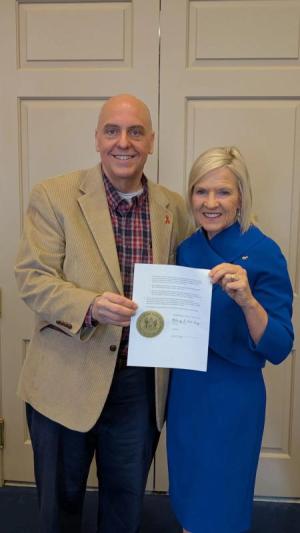Sussex Pride Executive Director David Mariner celebrates the creation of an LGBTQ+ Commission with Gov. Bethany Hall-Long. SUBMITTED PHOTO