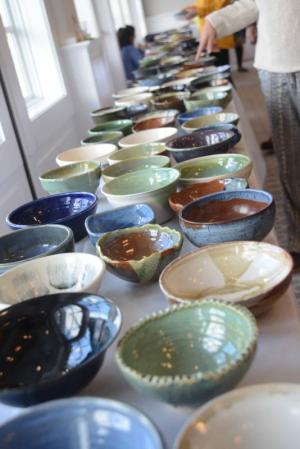 Each Empty Bowls ticketholder can choose from an array of artisan-crafted dishes to take home. FILE PHOTO