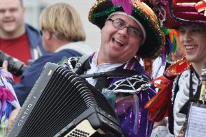 Dan Marakowski enjoys himself while playing the accordion for the Fralinger String Band at the Village of Five Points in 2013. BY NICK ROTH