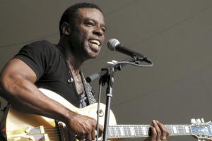 Brown intensifies the trio’s recipe of sound with his tried-and-true licks.